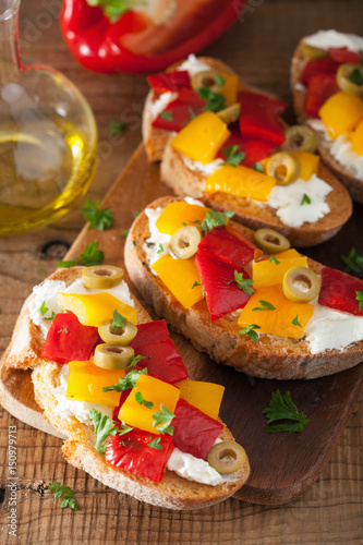 italian bruschetta with roasted peppers goat cheese olives