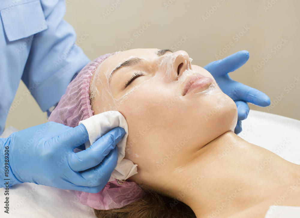 Process cosmetic mask of massage and facials in beauty salon 