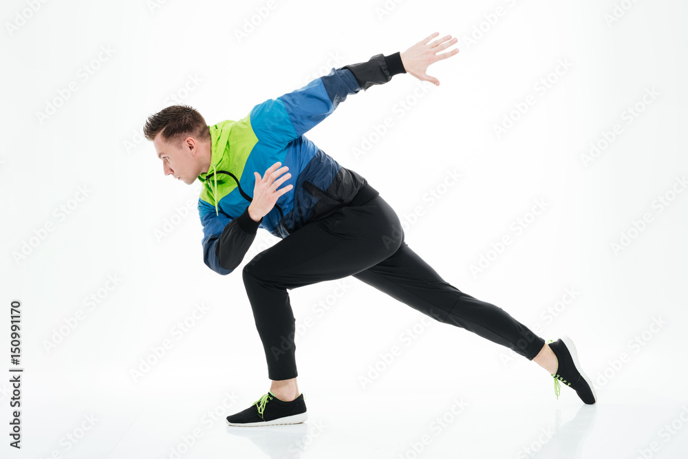 Serious strong sportsman running isolated
