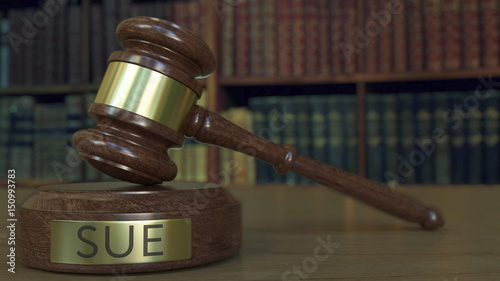 Foto Judge's gavel and block with SUE inscription. 3D rendering