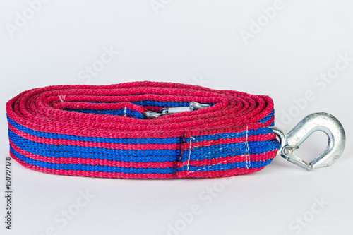 Blue/red towing rope with metal hooks isolated on a white background.