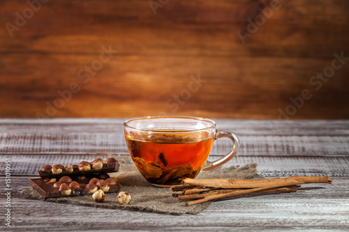 orange-pekoe chocolate and thin captain on a wooden table