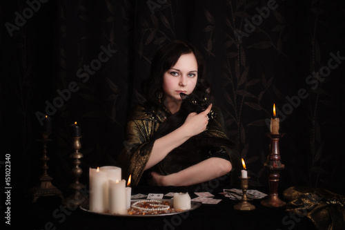 Εκτύπωση καμβά Young woman with divination cards in room
