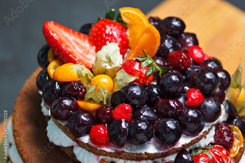 Cake with fresh fruits and berries