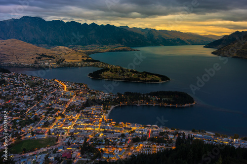 Cityscape of Queenstown and Lake Wakaitipu with The Remarkables in the background from viewpoint at Queenstown Skyline, New Zealand