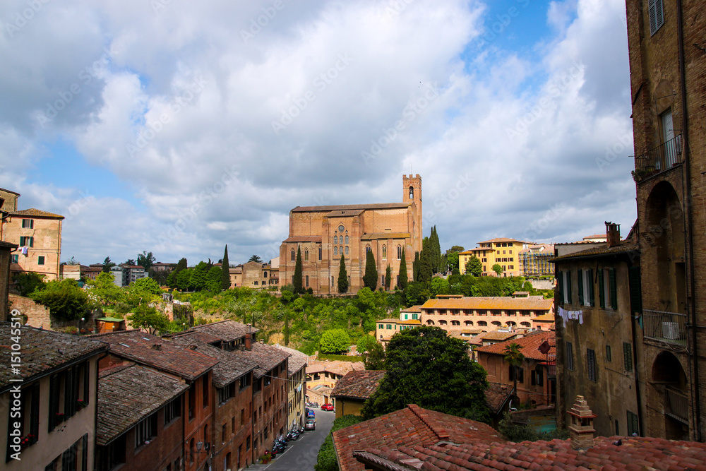Aerial view of Siena and Basilica of San Domenico (Basilica Cateriniana) is basilica church in Siena, Tuscany, Italy