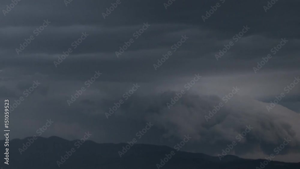 Spectacular clouds slithering over mountain range time-lapse Spectacular clouds slithering over mountain range time-lapse