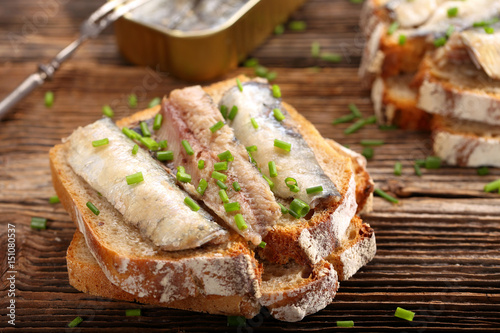 fresh sandwich with sardines on wholegrain bread photo