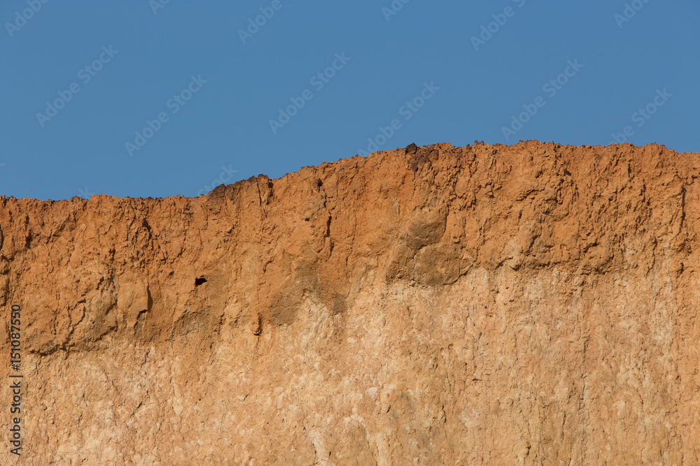 Soil cross section and blue sky