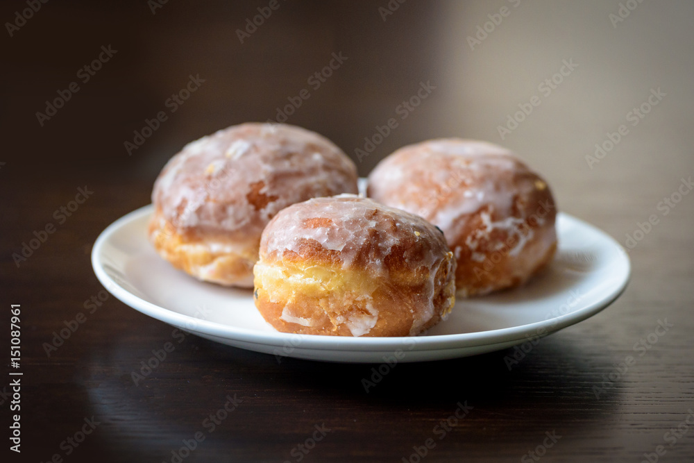 Donuts with flowers on a table Donuts with flowers on a table