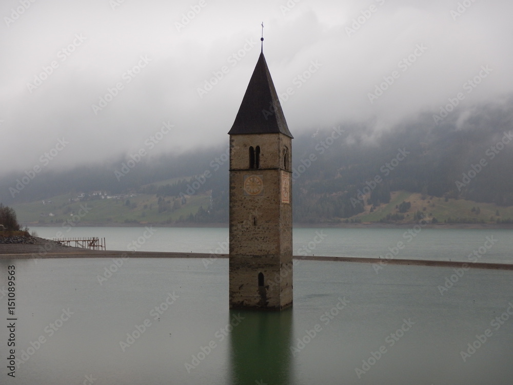 tower of sunken church in Resia lake