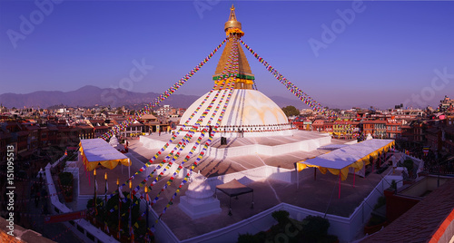 Kathmandu city view in the morning after sunrise with buddhist Boudhanath Stupa temple after renovation in the end of 2016. Tibetan traditional architecture, Nepal. Horizontal cityscape panorama
