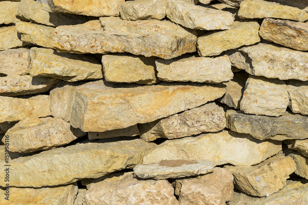 Fototapeta premium Stone background, pebble stones texture, Multi-colored stones background