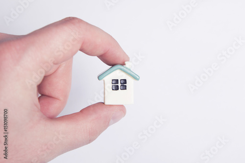 Little House in the Hand of a Man