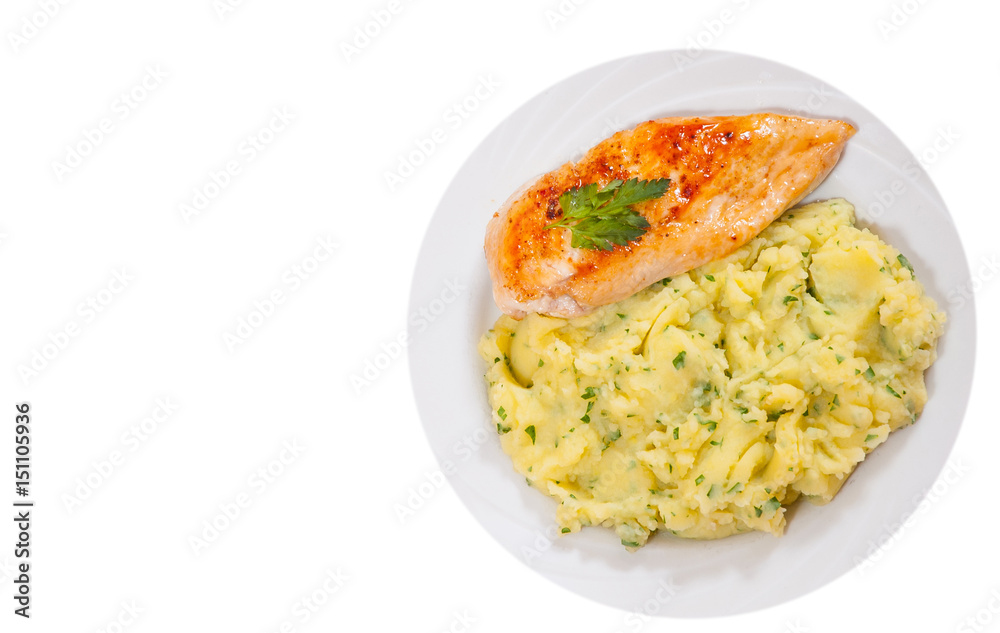 Roasted chicken breast and mashed potatoes. top view. isolated on white Roasted chicken breast and mashed potatoes. top view. isolated on white
