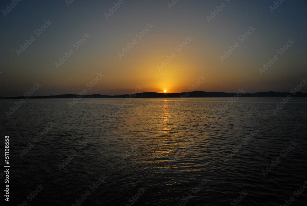 Yachting yacht sailboat sailing in adriatic sea at sunset sunrise summer vacation. Tourism luxury lifestyle.