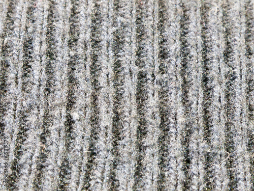 close up texture of bottom of blue jumper ribbed cotton