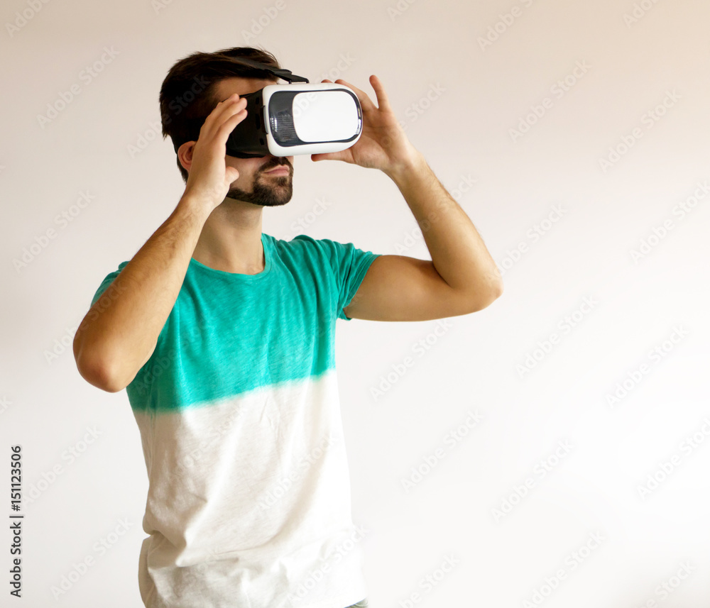 Fototapeta premium Man wearing virtual reality goggles.