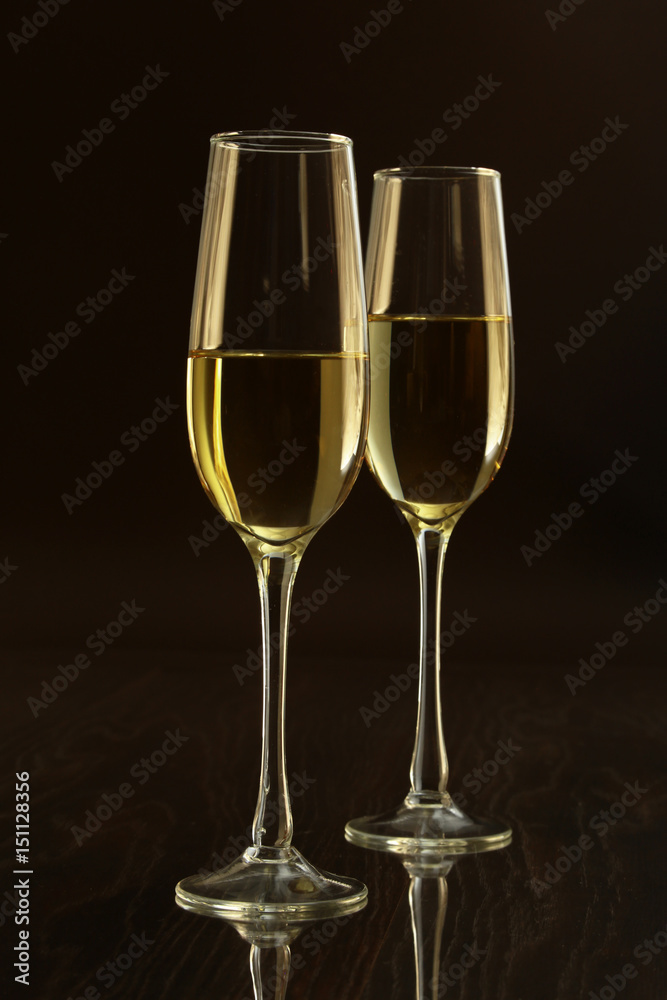 Glass with white, red wine and cognac or whisky on mirror table. Celebrities composition. selective focus Glass with white, red wine and cognac or whisky on mirror table. Celebrities composition. selective focus