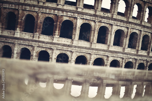 Magnificent view of the Great Roman Colosseum ( Coliseum, Colosseo ),also known as the Flavian Amphitheatre. Famous world landmark. Scenic urban landscape. Rome. Italy. Europe