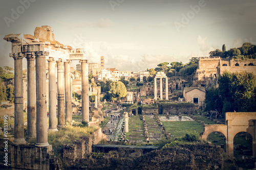 Roman ruins in Rome, Forum. Ancient ruins of the Romanum Forum. Ruins of Septimius Severus Arch and Saturn Temple, Rome, Italy.