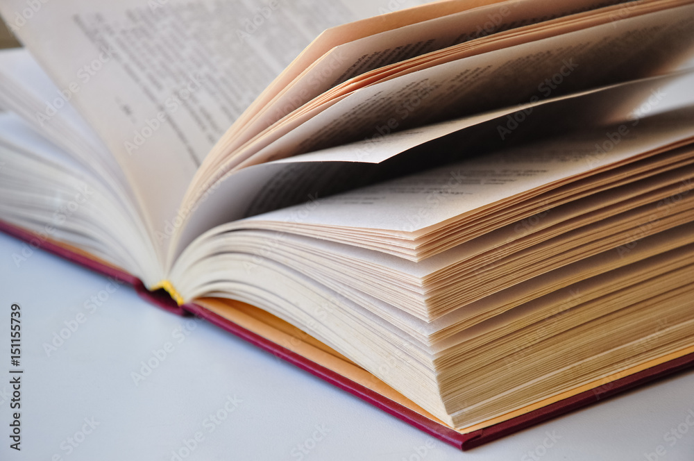 Open book isolated on white background closeup photo Open book isolated on white background closeup photo