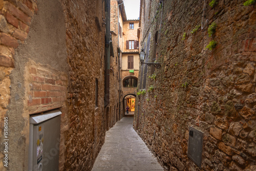 Fototapeta Naklejka Na Ścianę i Meble -   View of a street of the small and famous town of Volterra, Italy.