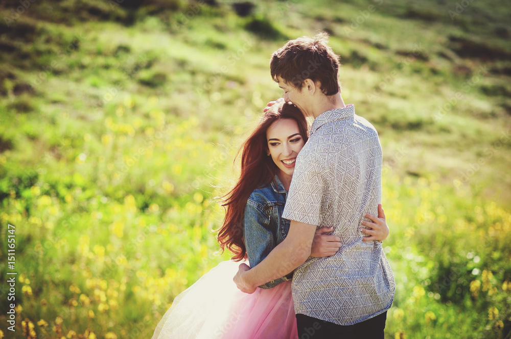 Smiling couple in love outdoors. happy lifestyle concept. Love story Smiling couple in love outdoors. happy lifestyle concept. Love story