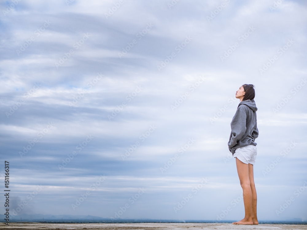 woman standing on the roof