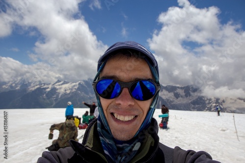 A man makes selfie in yhe slope of Elbrus mountain