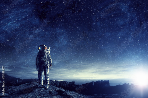Obraz na płótnie Astronaut in outer space. Mixed media