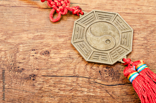 Close up metal sign of Yin Yang coin.