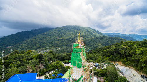 new pagoda of Thepnimit temple on hilltop at Patong beach Phuket