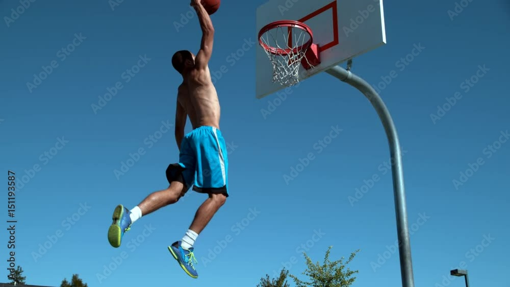 Super slow motion shot of basketball basketball slam dunk, shot on Phantom Flex 
