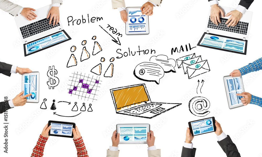 Top view of businesspeople sitting at table and using gadgets Top view of businesspeople sitting at table and using gadgets