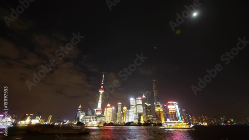 Shanghai bund at night,Brightly lit world financial center building. photo