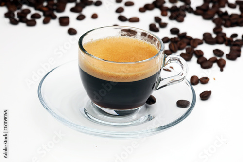 Coffee cup and beans on a white background.