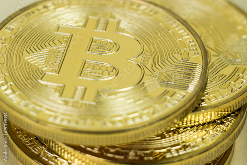 Photo Of Golden Bitcoin virtual currency coin. photo