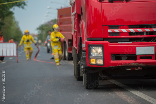 firefighter control the fire on the road