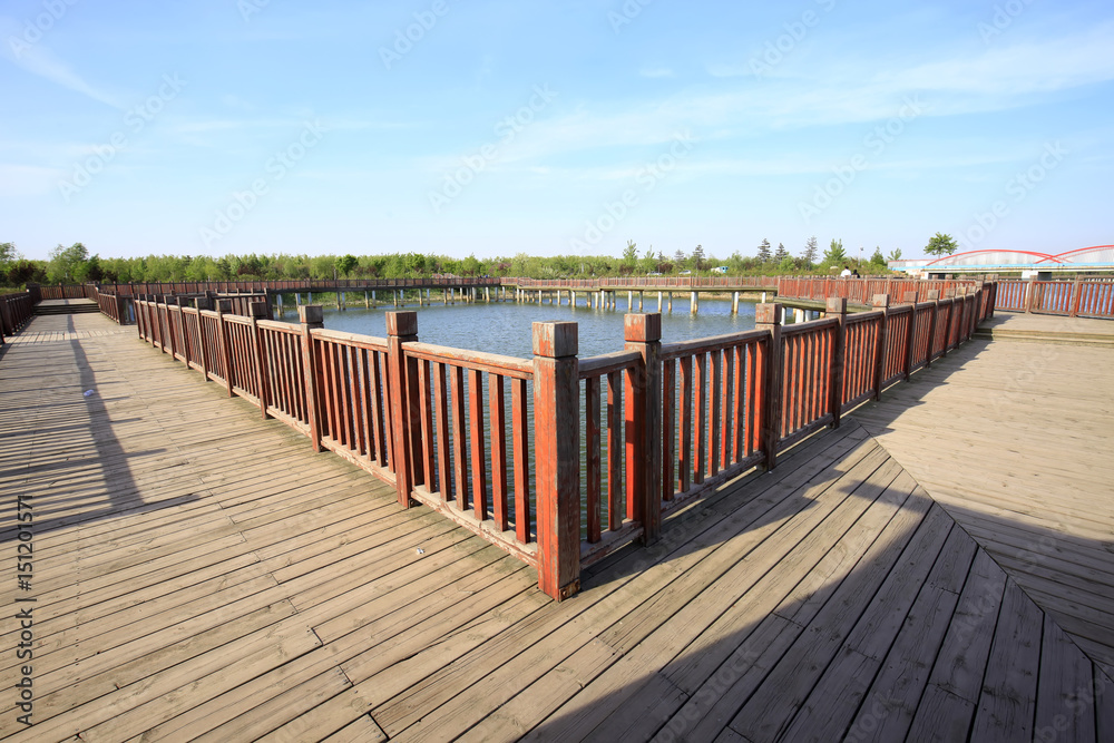 Wooden bridge on the river Wooden bridge on the river