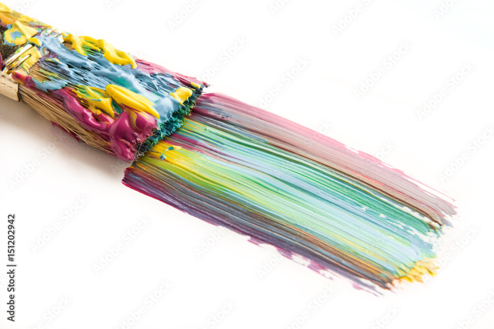close up view of brush and colorful brushstroke on white close up view of brush and colorful brushstroke on white