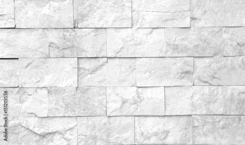 pattern gray color of modern style design decorative uneven cracked real stone wall surface with cement.