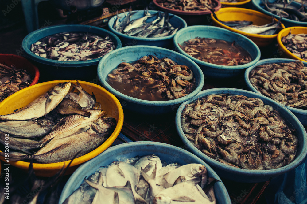 Goa - India-January 17 : fish auction in Goa wholesale fish market, India,a lot of fresh fish and shrimp in the containers. Siolim. Goa - India-January 17 : fish auction in Goa wholesale fish market, India,a lot of fresh fish and shrimp in the containers. Siolim.
