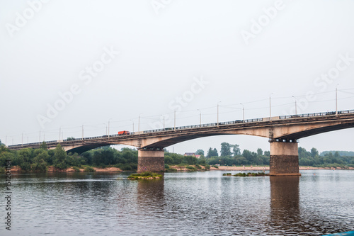 Bridge on the river on a summer evening