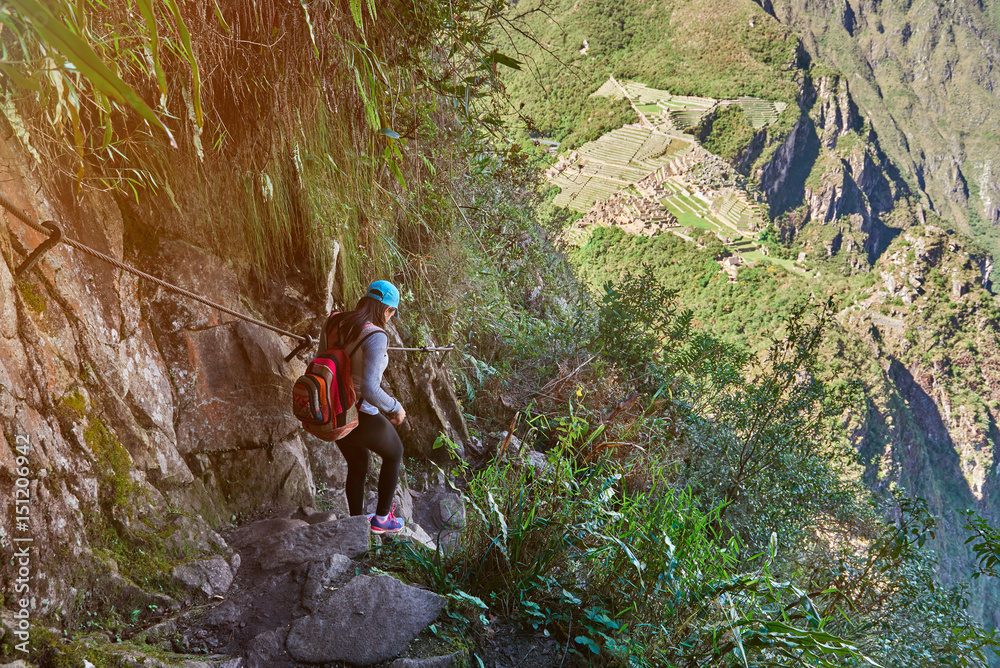 Young woman walk in machu picchu Young woman walk in machu picchu