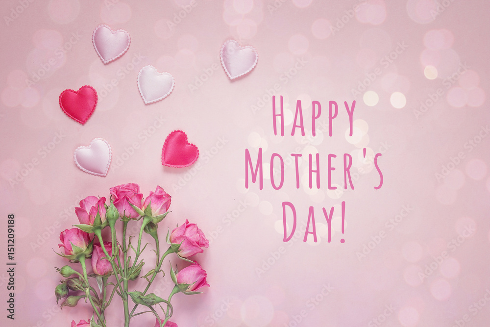 Mothers Day message with bouquet of roses and hearts on a pink background. Mothers Day message with bouquet of roses and hearts on a pink background.
