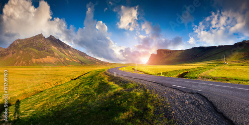 Typical Icelandic landscape with asphalt road