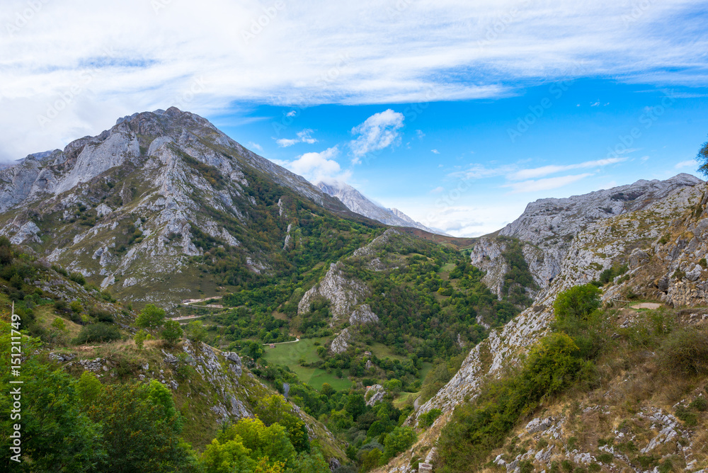 Obraz premium The valley of river Duje, spanisch Vale do Rio Duje, situated in east side of the mountain range Los Picos de Europa, Asturias Spain. The valley is wonderful for hiking and leads along the river Duje