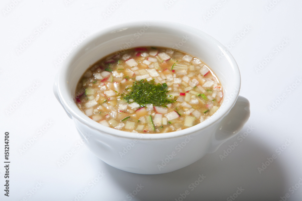 Russian cold vegetable soup on yogurt, sour-milk base - okroshka Russian cold vegetable soup on yogurt, sour-milk base - okroshka