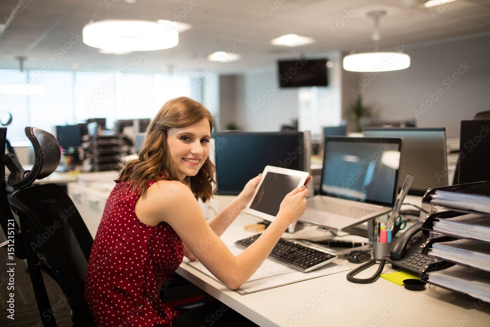 smiling businesswoman holding digital tablet smiling businesswoman holding digital tablet